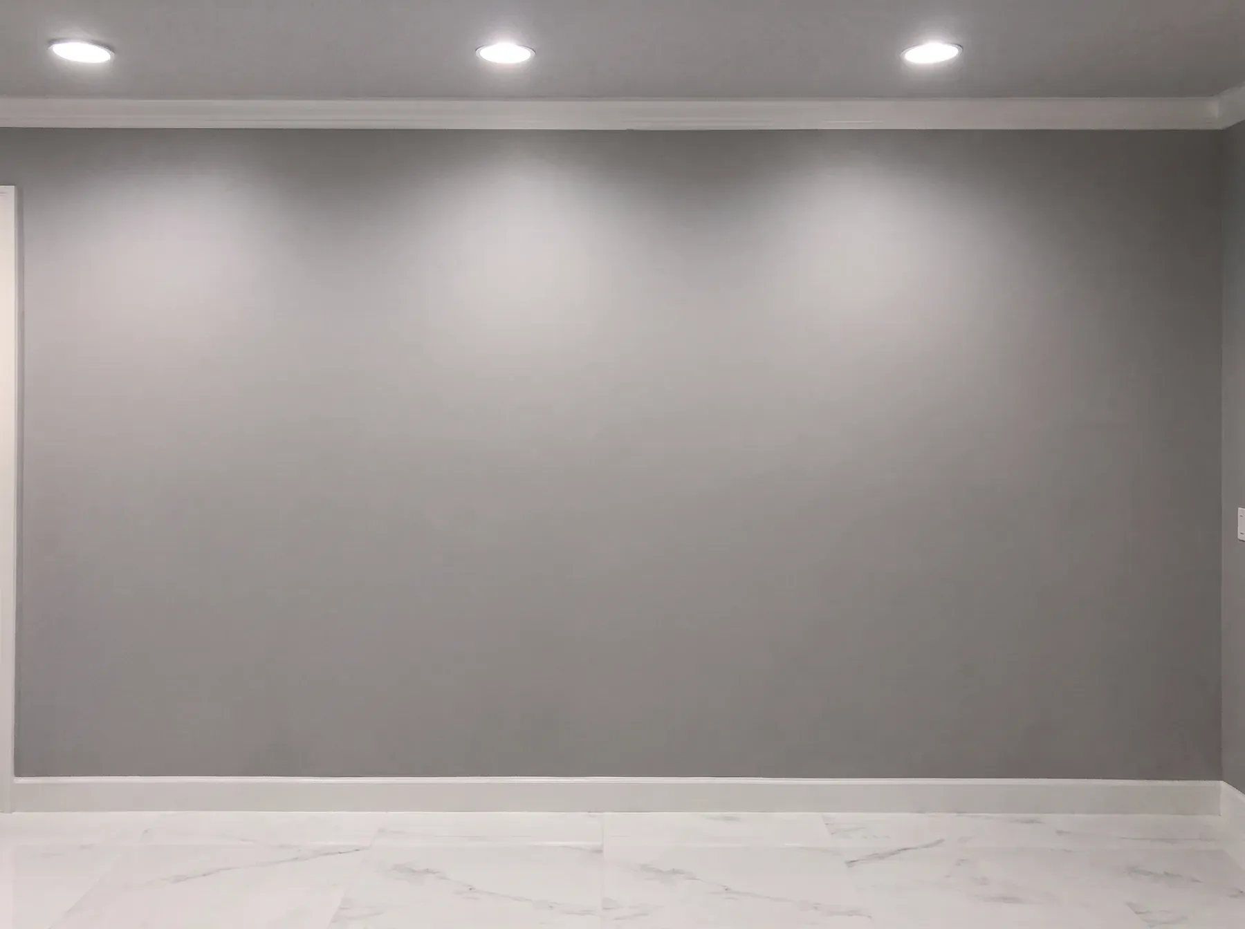 Vertical Tile Wall & Floating Hearth before the installation: the original blank wall